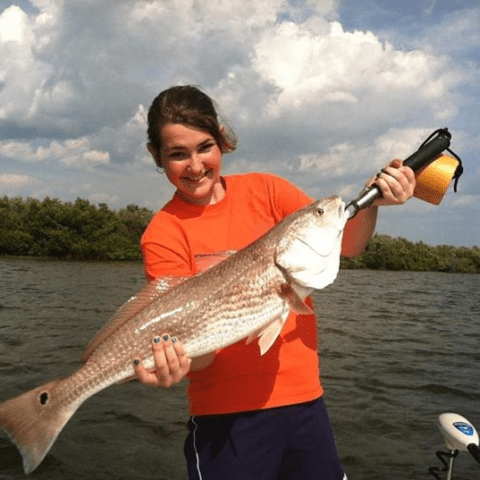 Person holding fish