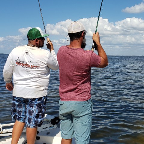 Person holding fish
