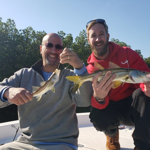 Person holding fish