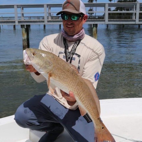 Person holding fish
