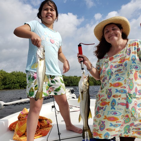 Person holding fish