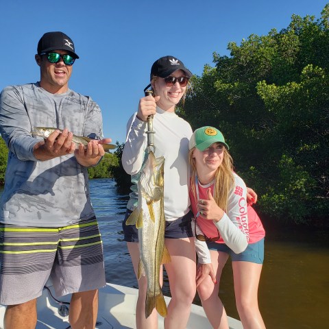 Person holding fish