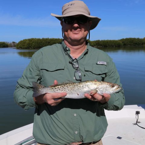 Person holding fish