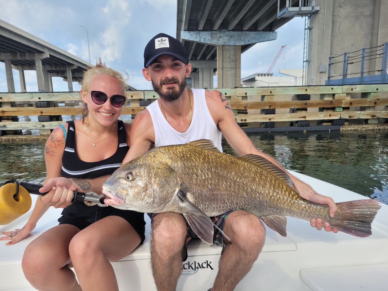 a person holding a fish